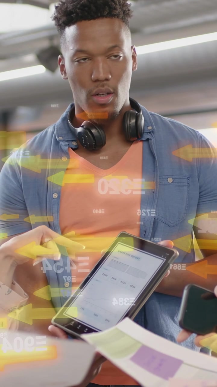 Vertical video: Lead with tablet reviewing design as team handing colors, arrows, numbers appearing