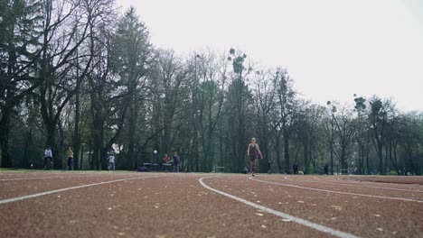track runner athlete woman warming up before running at a stadium. sport. healthy fitness lifestyle.