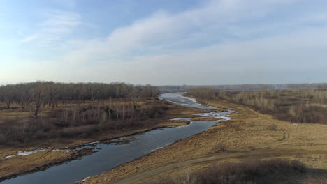 spring flight over siberian river