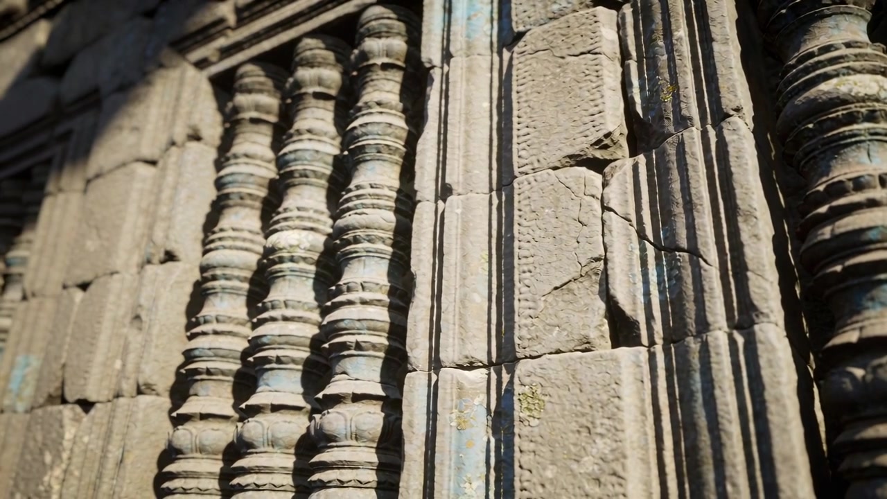 Revealing shafts, molded band as camera panning left down at temple for study, showing blue traces