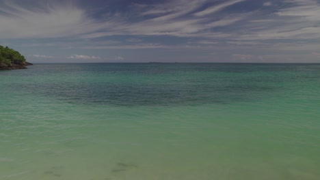 Flyby-over-tropical-Crystal-Clear-Waters-Revealing-the-Ocean,-Dominican-Republic