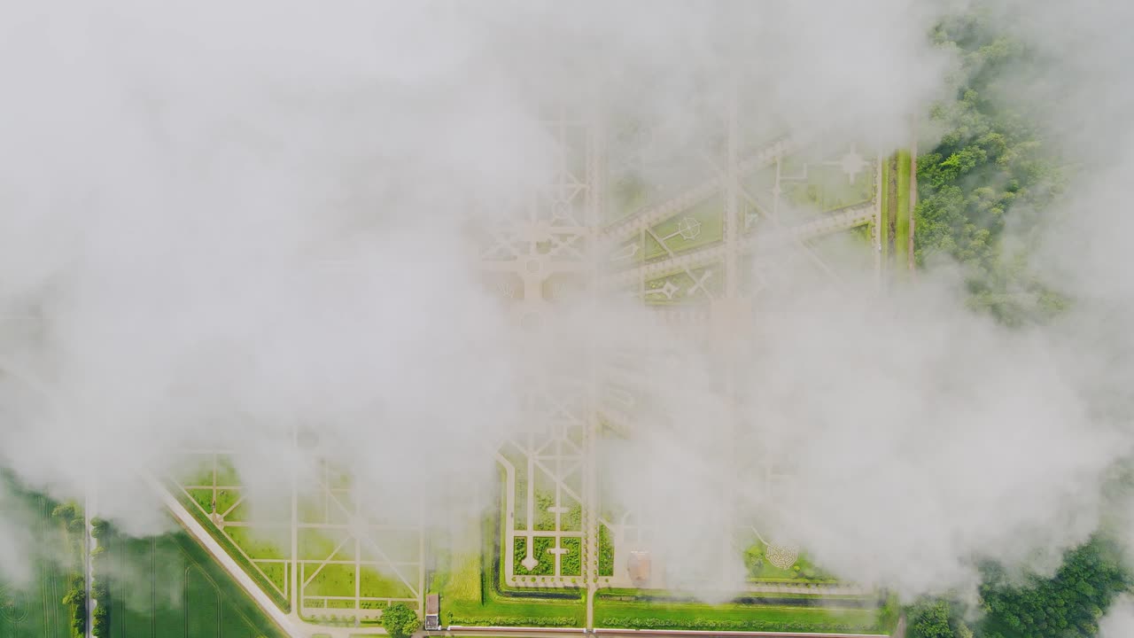 Static top down shot, Latvia’s baroque Rundāle Palace gardens veiled by clouds