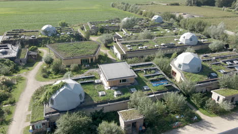 aerial of beautiful earthship community in the netherlands