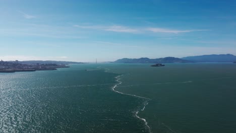 Aerial-drone-shot-showing-with-water-mixing-from-the-Pacific-Ocean-and-San-Francisco-Bay