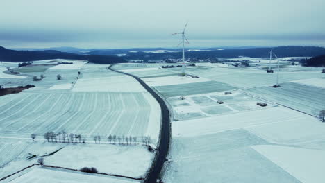 winter landscape with wind turbines