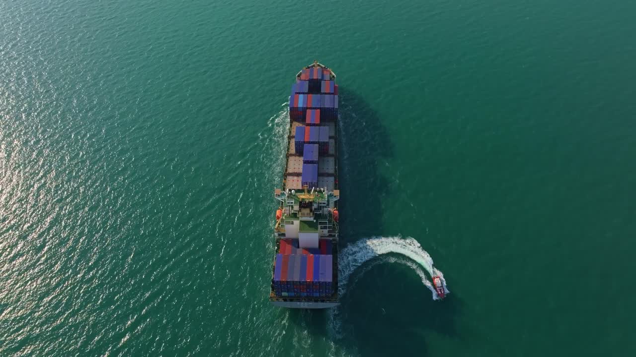 Drone view of container vessel transporting goods, Thailand