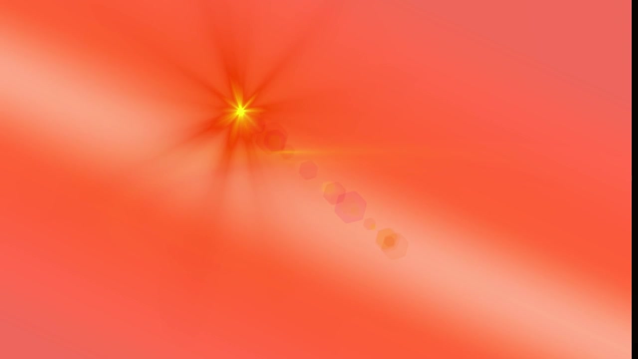 動く金色の光のフレアがある抽象的な赤い背景