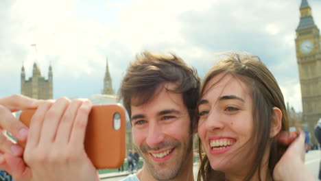 Young-couple-waving-during-a-video-call-made-using