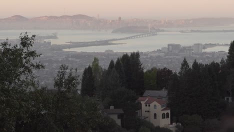 closeup upward pan of east bay and san francisco early morning