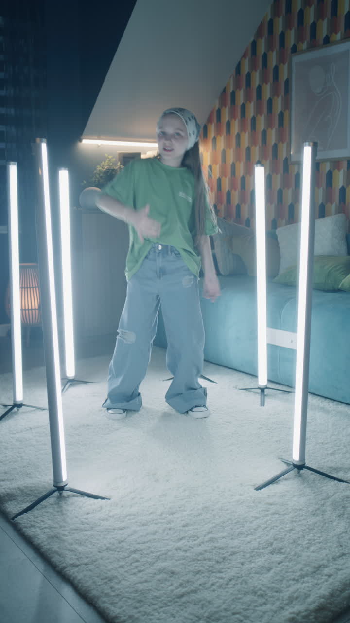 Young Girl Gesturing while Father Sings Enthusiastically during Car Ride a Young Girl Wearing a Pink Beanie and Jacket is Seated in the Car as she Gestures with her Handsa Blurred Man Wearing Glasses and a Green Jacket is Visible in the Drivers Seat Singing
