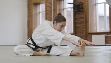 young woman stretching