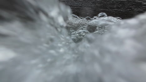 water gently bubbles up, flowing over the camera and creating a serene atmosphere