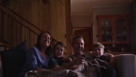 family spending time together at home in the evening