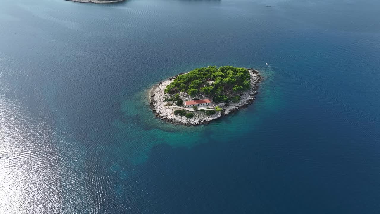 Former Fortress In Uninhabited Island Of Galisnik In Hvar, Croatia. aerial shot
