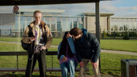 Young-man-at-bus-stop