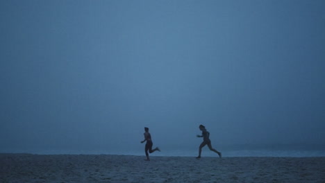 Women-silhouette,-running-and-beach