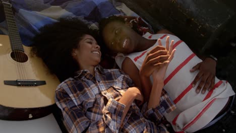 couple relaxing in pickup truck at beach 4k