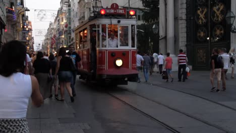 the istanbul nostalgic tramway heritage tram is passing by istiklal avenue in turkey