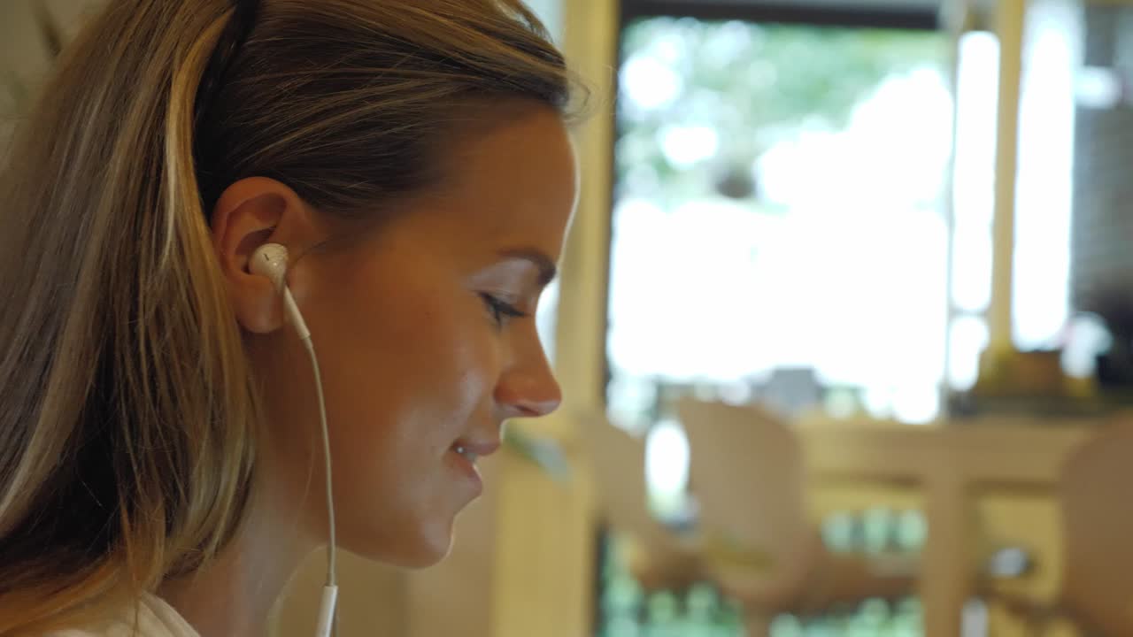 A Beautiful Woman Sharing Ideas Over Online Forums On Fitness, Beauty And Wellness - Close Up