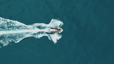 Aerial-top-view-following-science-boat-cruising-in-Sète,-France