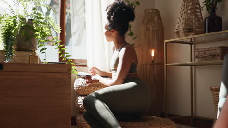 woman relaxing and journaling at home