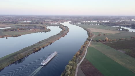 aerial of a cargo ship on a river