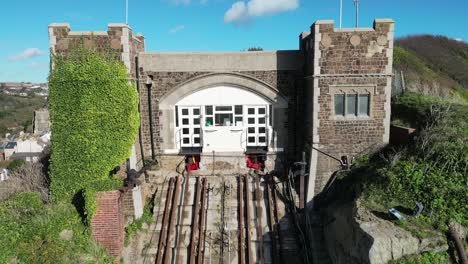 aerial drone shot of hastings uk, camera flying over the east hill cliff railway