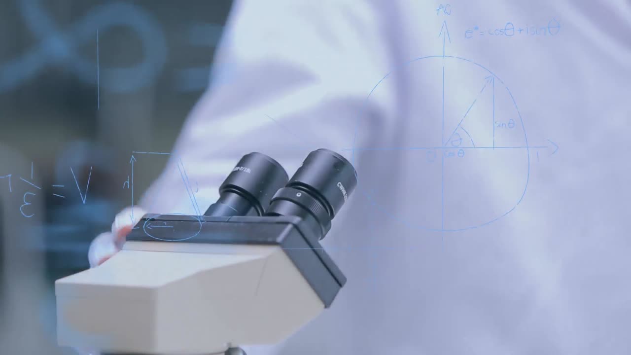 科学者が ⁇ 微鏡で研究している