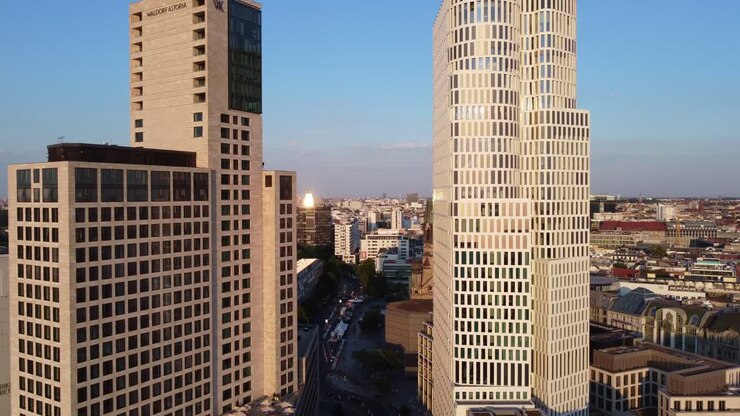 Golden Hour Office Window best View Sunset
Amazing aerial view flight fly through drone footage auf Skyscraper in Charlottenburg sunny Summer Evening 2022