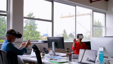 executives using virtual reality headset at desk 4k