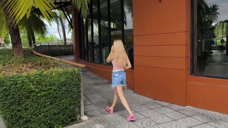 woman walking in a shopping mall