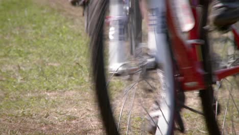 Dozens-of-bikers-race-on-a-rough-course-terrain