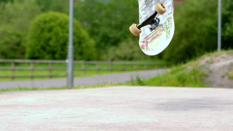 Young-skateboarder-skating-the-outdoor-skatepark