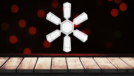 animation of snowflake christmas decorations on red spots and wooden surface background