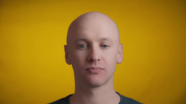 Man looking around with boredom