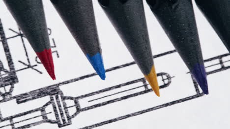 colored pencils on architectural blueprint