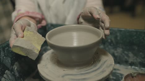 professional hands in clay pottery in pakistan. arts.