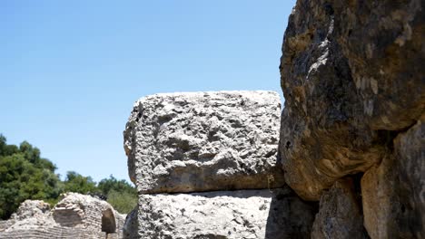 butrint, albania, massive stone blocks at the top of the wall of ancient roman ruins