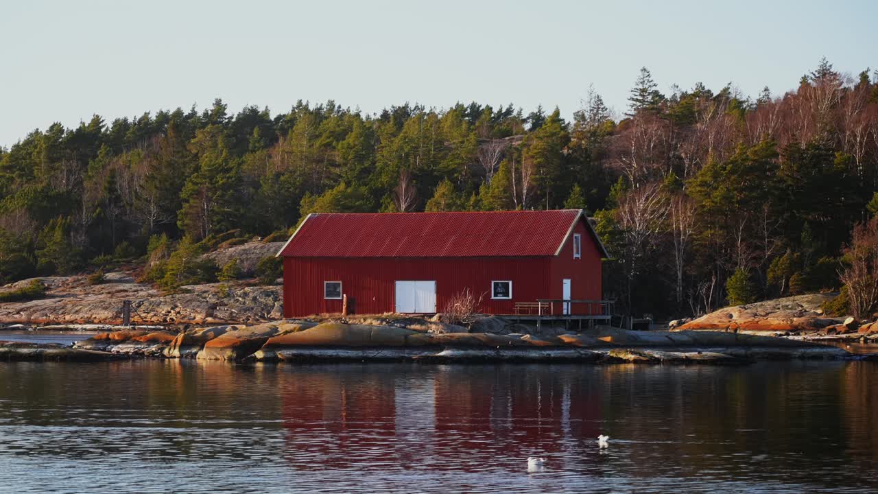 Sandefjord Nötholmens Naturreservat Strömstad Marina Red building seagull birds coastal seaside town Stromstad Sweden Sverige ferry boat ride Norge Scandinavia arctic golden hour sunset coastline