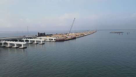 aerial showing the massive expansion of the howard franklin bridge in tampa bay, florida