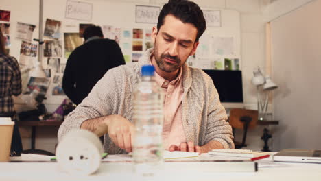 young man working in creative startup company