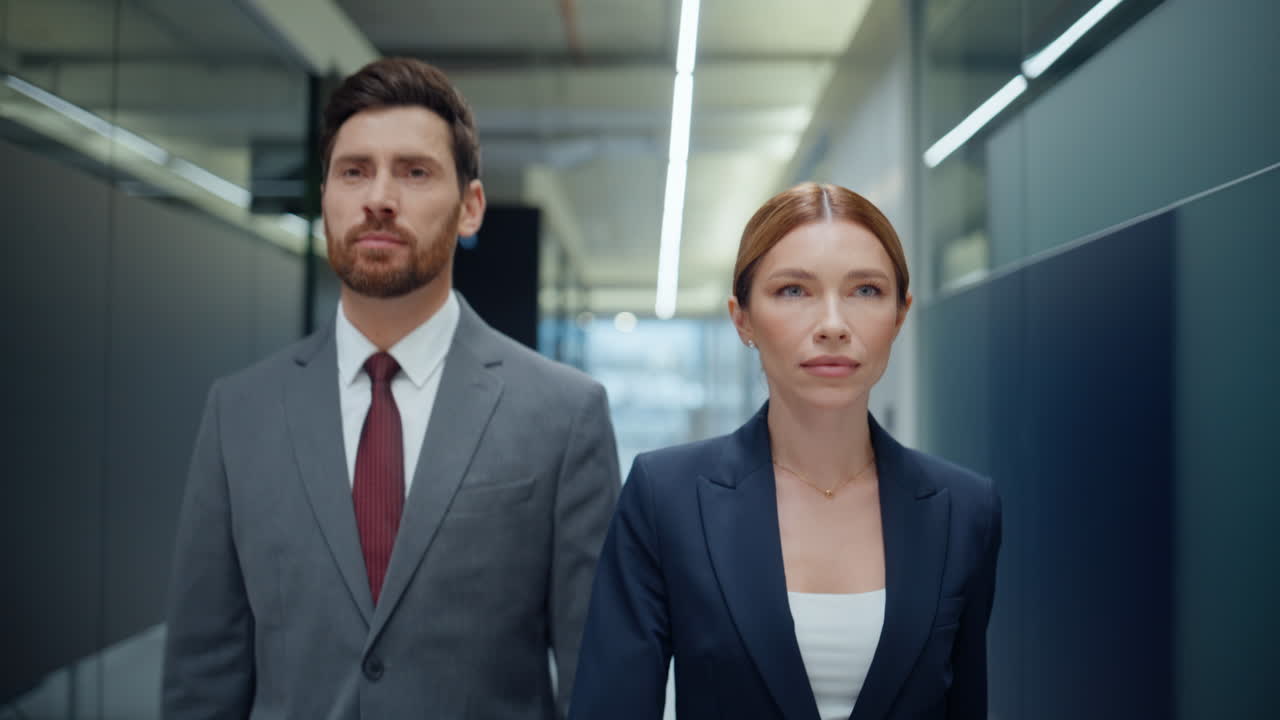 Rich business people strolling vestibule closeup. Businessman pointing finger