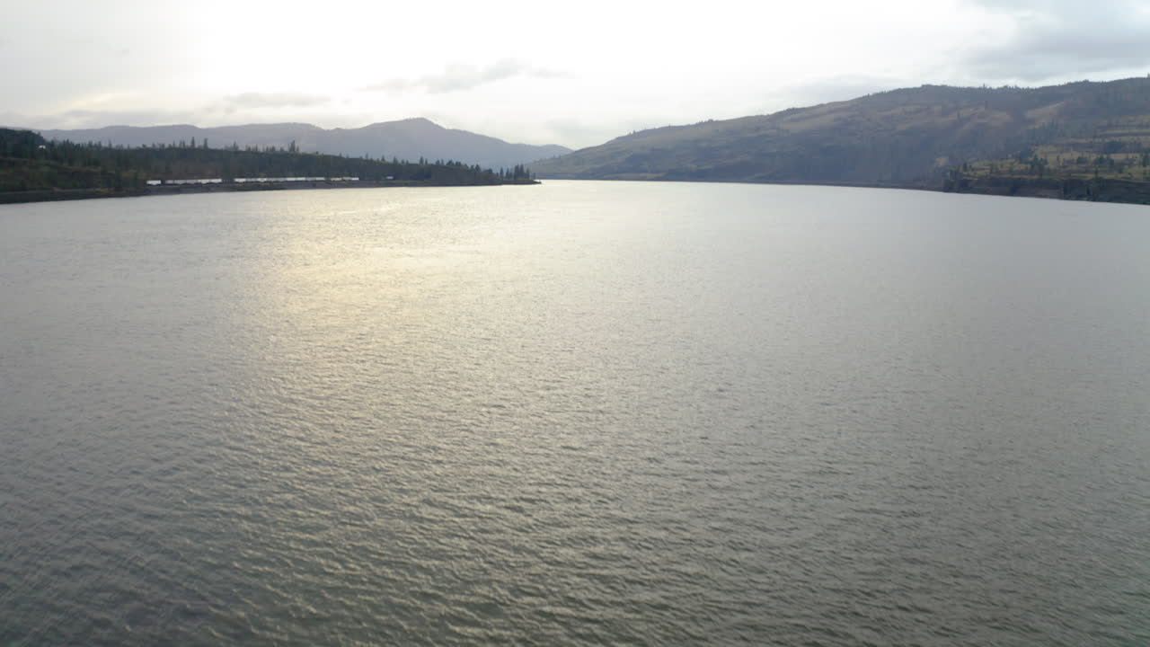 Calm Water Surface with Sunlight Reflection