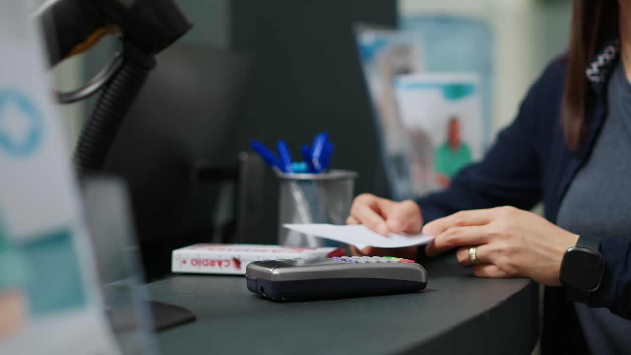 Image of a person in a clinic scanning a medical prescription