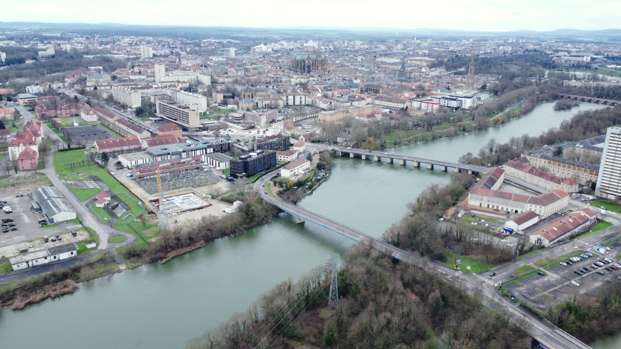 Aerial view of a French city with a river and bridges