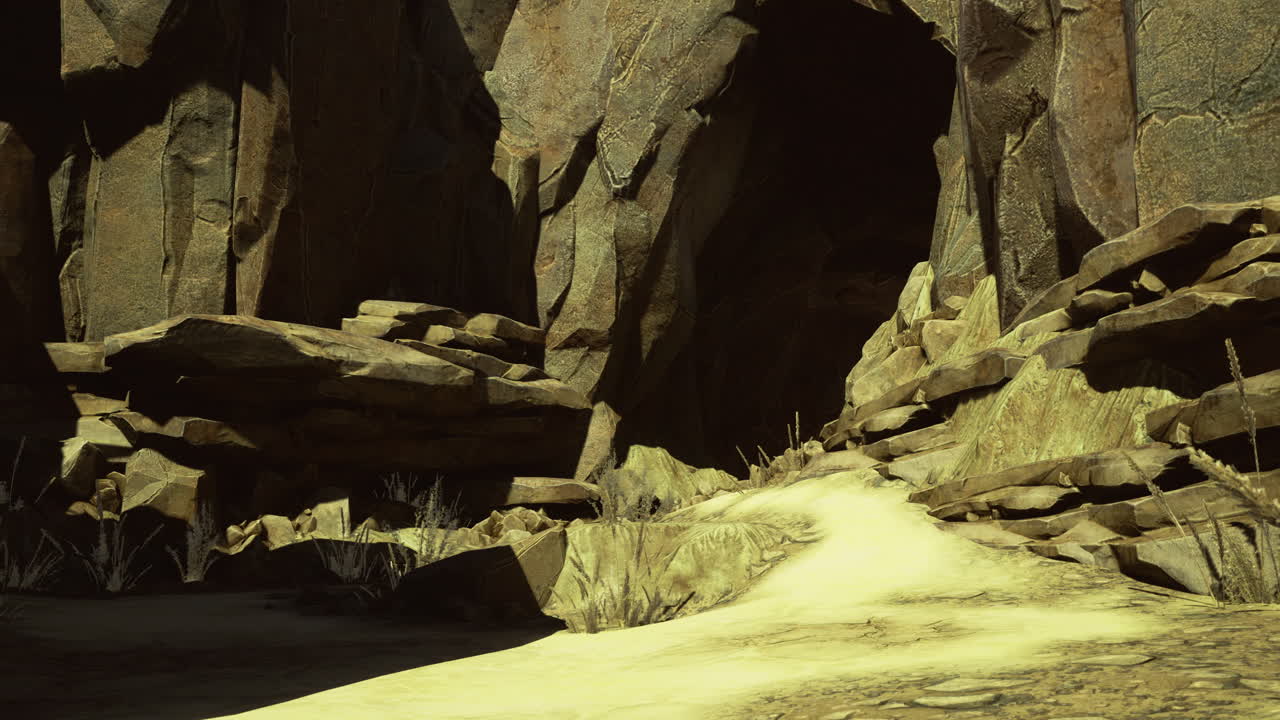 Vast rocky landscape with a winding pathway leading into a shadowy cave