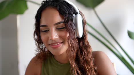 immersed in love and joy, she smiles while reading, writing, and chatting with headphones on a symphony of emotions in every keystroke