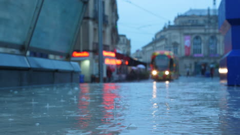 pool of water montpellier place de la comédie rainy day france tramway opera