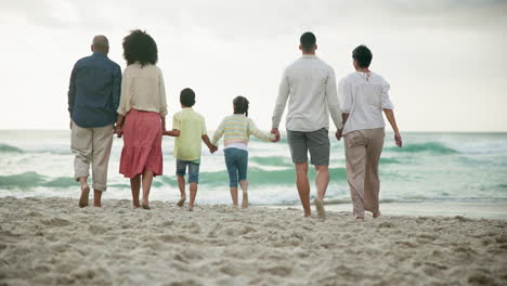 multigenerational family enjoying a beach day
