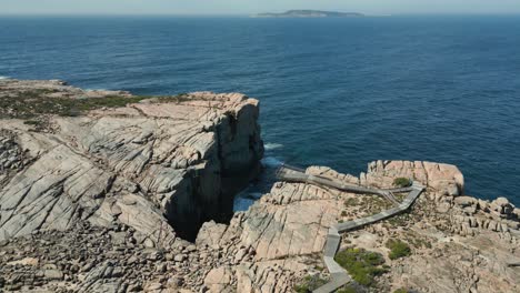 aerial view over the gap and natural bridge lookout in torndirrup national parc on a sunny day, albany, western australia